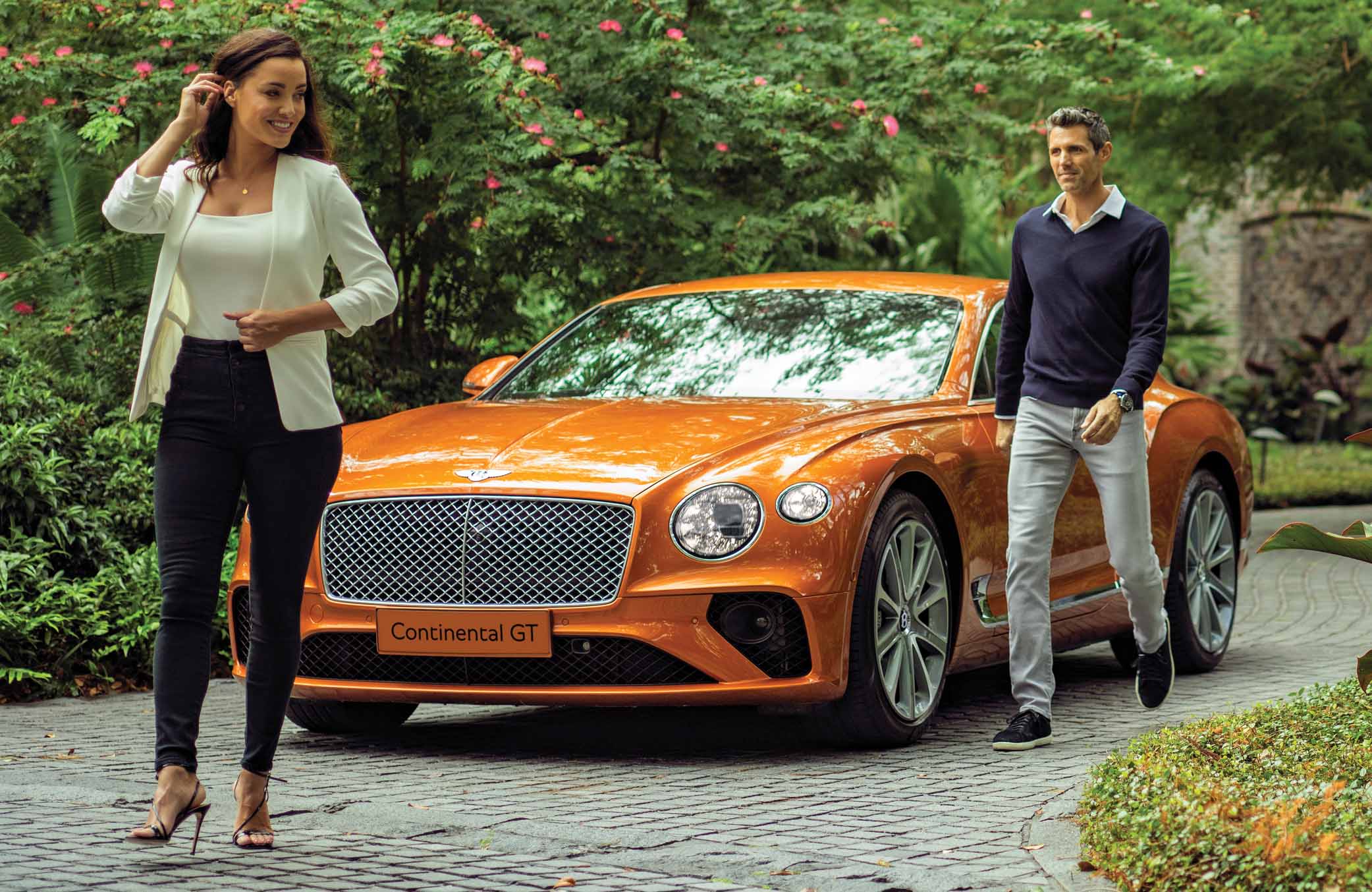 Bentley Continental GT in Driveway with couple