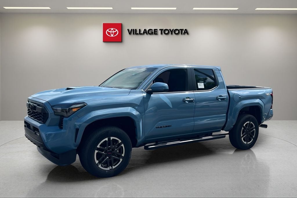 2026 Toyota Tacoma TRD Sport in Heritage Blue — front three-quarter view