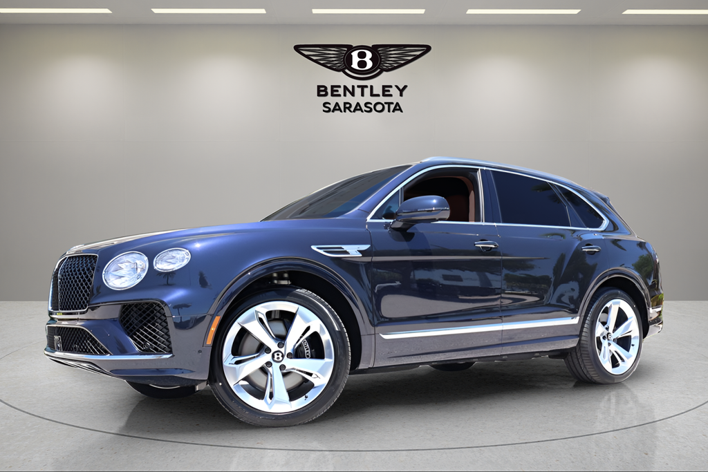2026 Bentley Bentayga V8 in Dark Sapphire — front three-quarter view