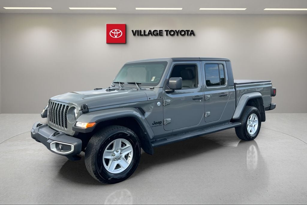 2021 Jeep Gladiator Sport in Sting-Gray Clearcoat — front three-quarter view