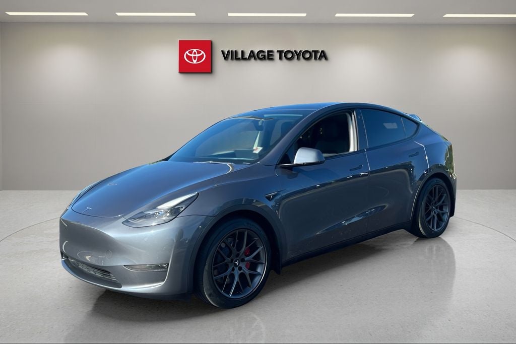 2023 Tesla Model Y Performance in Midnight Silver Metallic — front three-quarter view