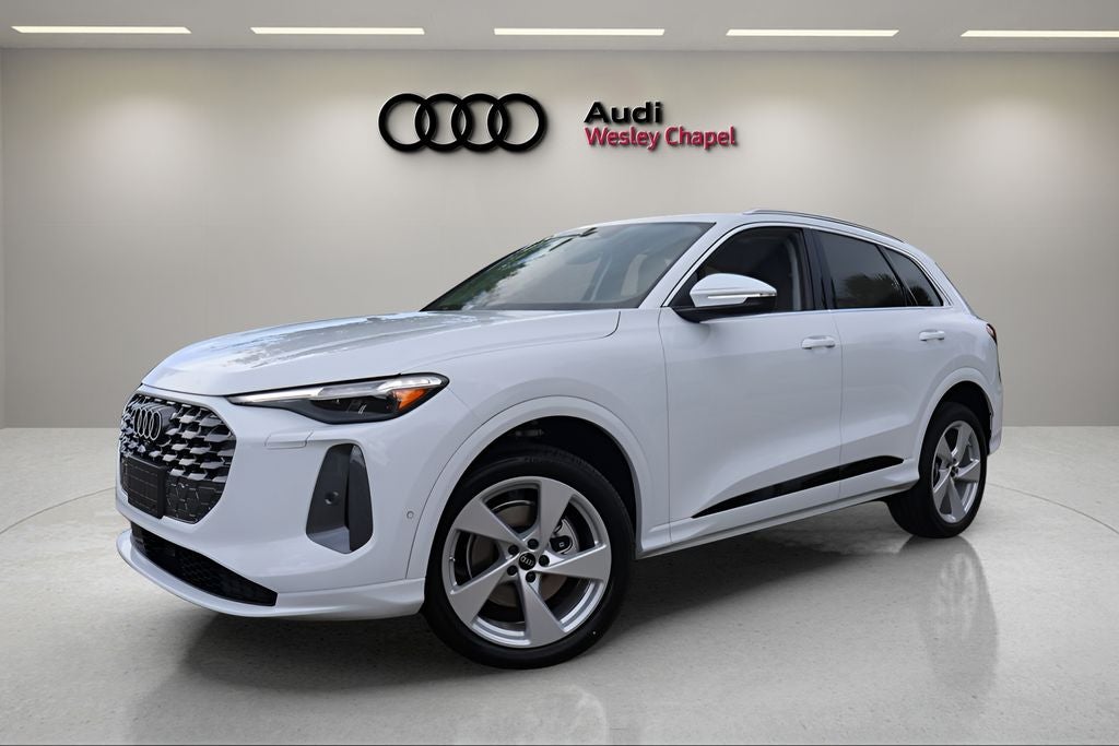 2026 Audi Q5 2.0T Premium Plus quattro in Glacier White Metallic — front three-quarter view