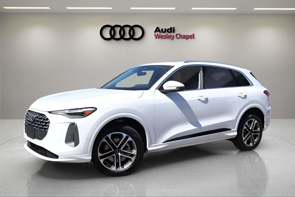 2026 Audi Q5 2.0T Premium Plus quattro in Glacier White Metallic — front three-quarter view