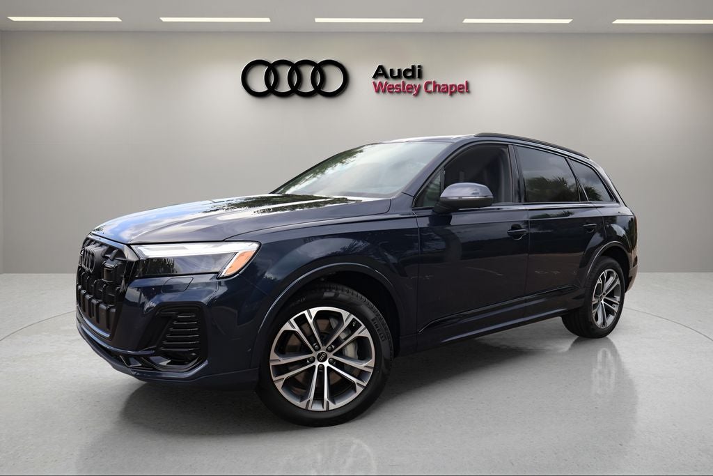 2026 Audi Q7 45 Premium quattro in Waitomo Blue Metallic — front three-quarter view