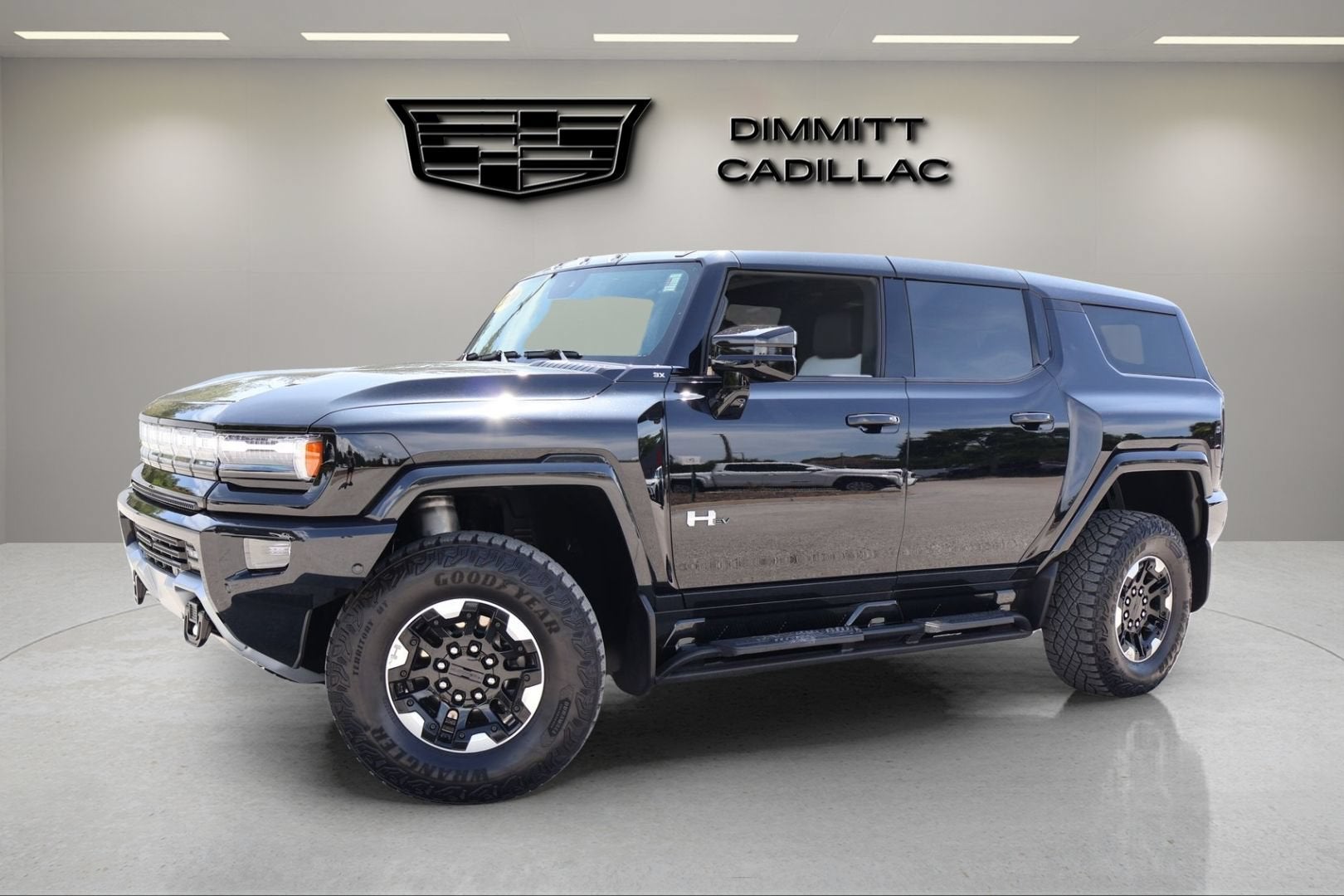2024 GMC HUMMER EV SUV 3X in Void Black — front three-quarter view
