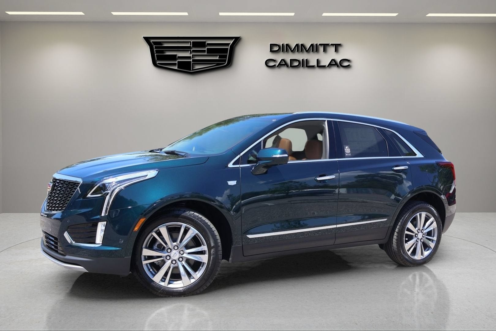 2026 Cadillac XT5 Premium Luxury in Emerald Lake Metallic — front three-quarter view