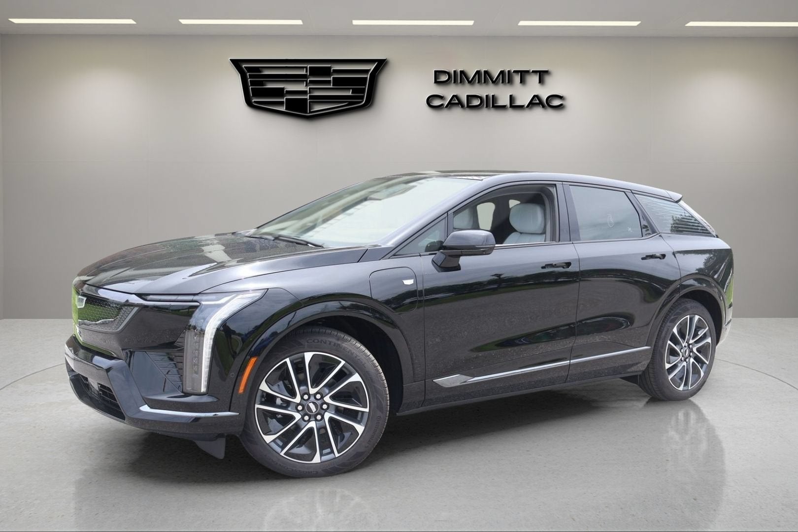 2026 Cadillac OPTIQ Sport in Black Raven — front three-quarter view