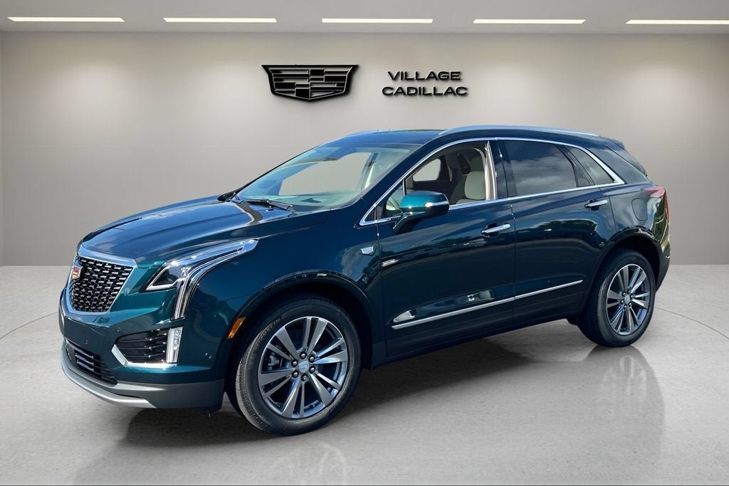 2026 Cadillac XT5 Premium Luxury in Emerald Lake Metallic — front three-quarter view