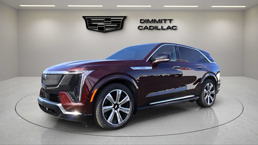 2025 Cadillac ESCALADE IQ Luxury 2 in Black Cherry Tintcoat — front three-quarter view
